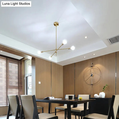 Lámpara de araña dorada ajustable contemporánea con pantalla de globo de cristal transparente - Iluminación colgante de 4 bombillas