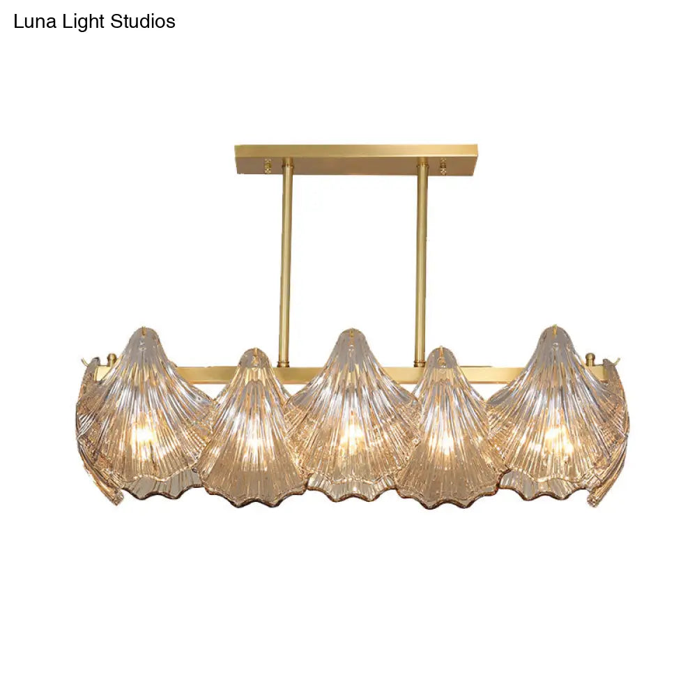 Lámpara colgante contemporánea DecorBites™ de cristal ámbar con iluminación de isla en latón - 8 luces, brazo metálico lineal