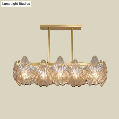 Lámpara colgante contemporánea DecorBites™ de cristal ámbar con iluminación de isla en latón - 8 luces, brazo metálico lineal