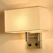 Contemporary wall lamp with a beige fabric shade and polished chrome base featuring integrated usb ports