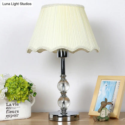 Contemporary Beige Scalloped Nightstand Lamp with Clear Crystal Ball Accent - 1 Light Night Table Lighting