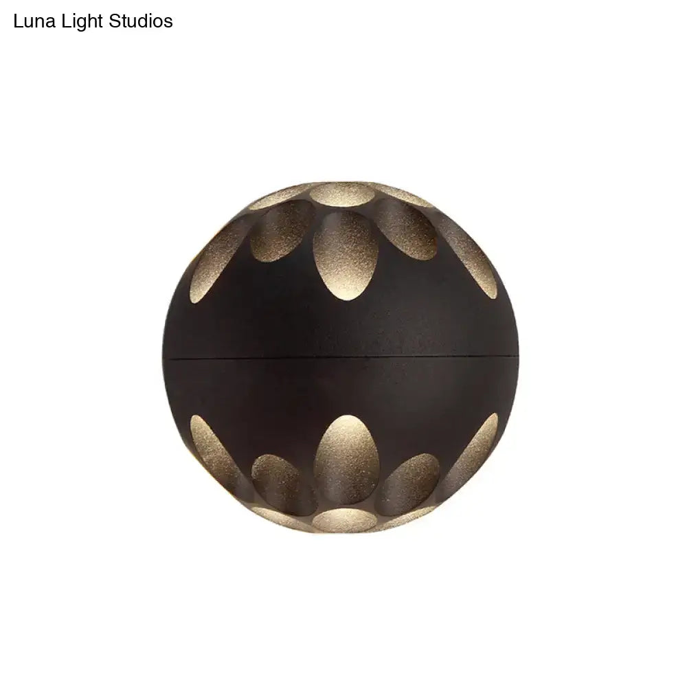 Contemporary black and gold spherical led wall lamp with petal-shaped cutouts for bedroom wall light use