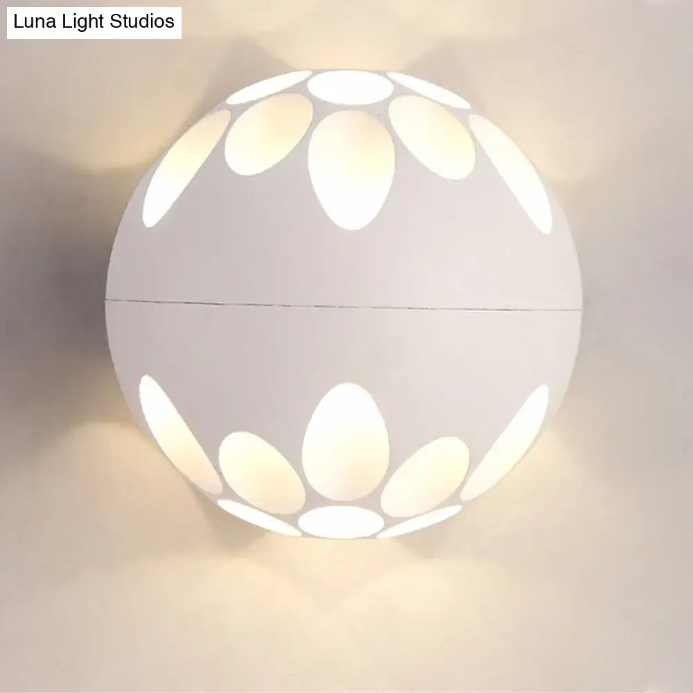Contemporary black and gold spherical led wall lamp with white floral cutout wall light for bedroom use
