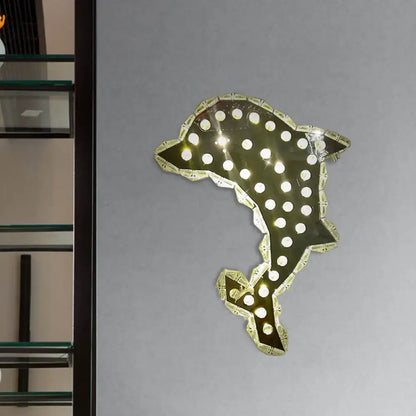 Contemporary black and white crystal prism dolphin wall light with gold-toned outline and embedded circular lights
