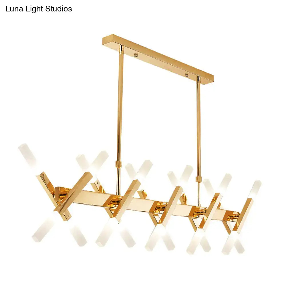 Gold-finished modern DecorBites island pendant light with intersecting geometric arms and frosted glass fixtures