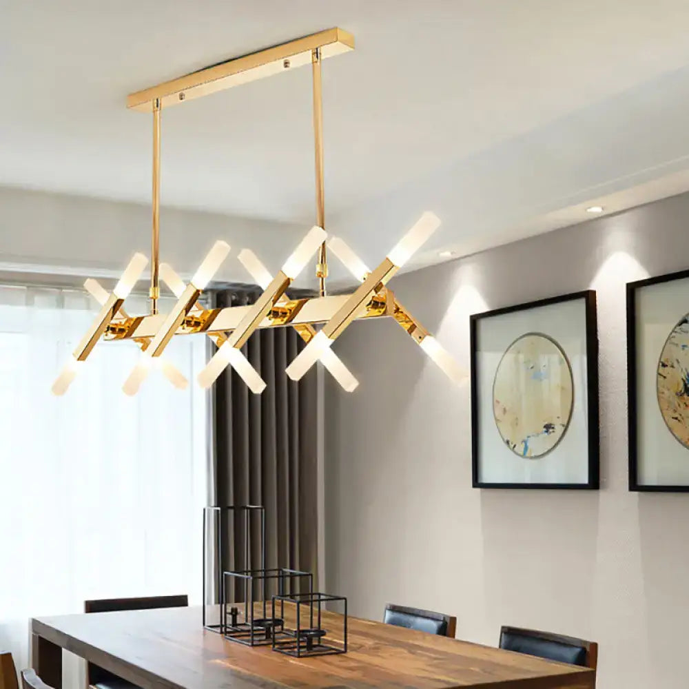 Decorbites™ contemporary gold island pendant light with intersecting x-shaped arms and frosted glass fixtures
