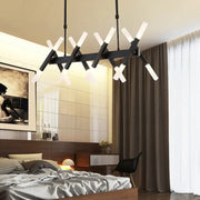 DecorBites™ contemporary black and gold island pendant light with geometric iron arms and frosted glass fixtures for living room