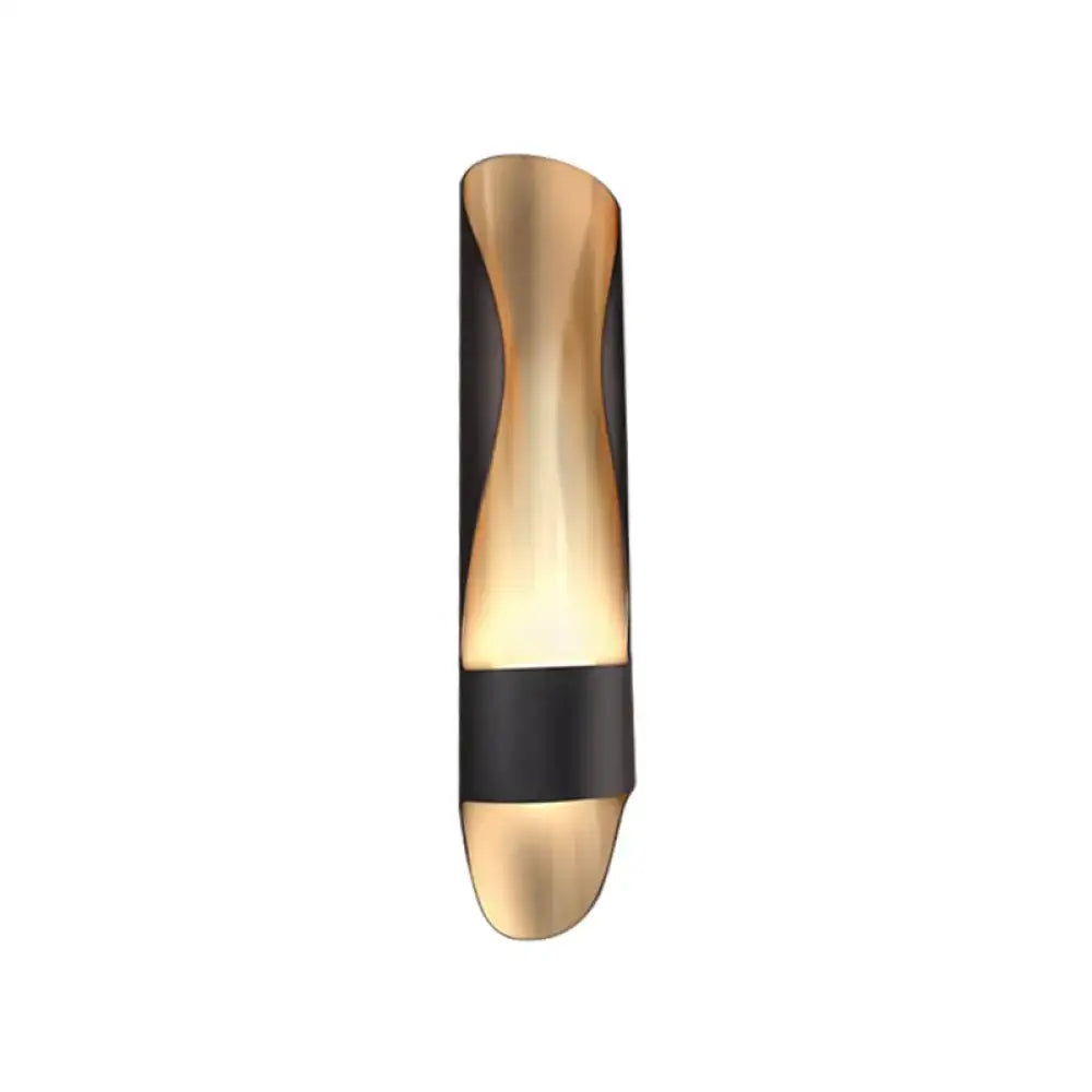 Contemporary black and gold twisted led wall sconce with sleek curved design in polished gold and matte black finishes