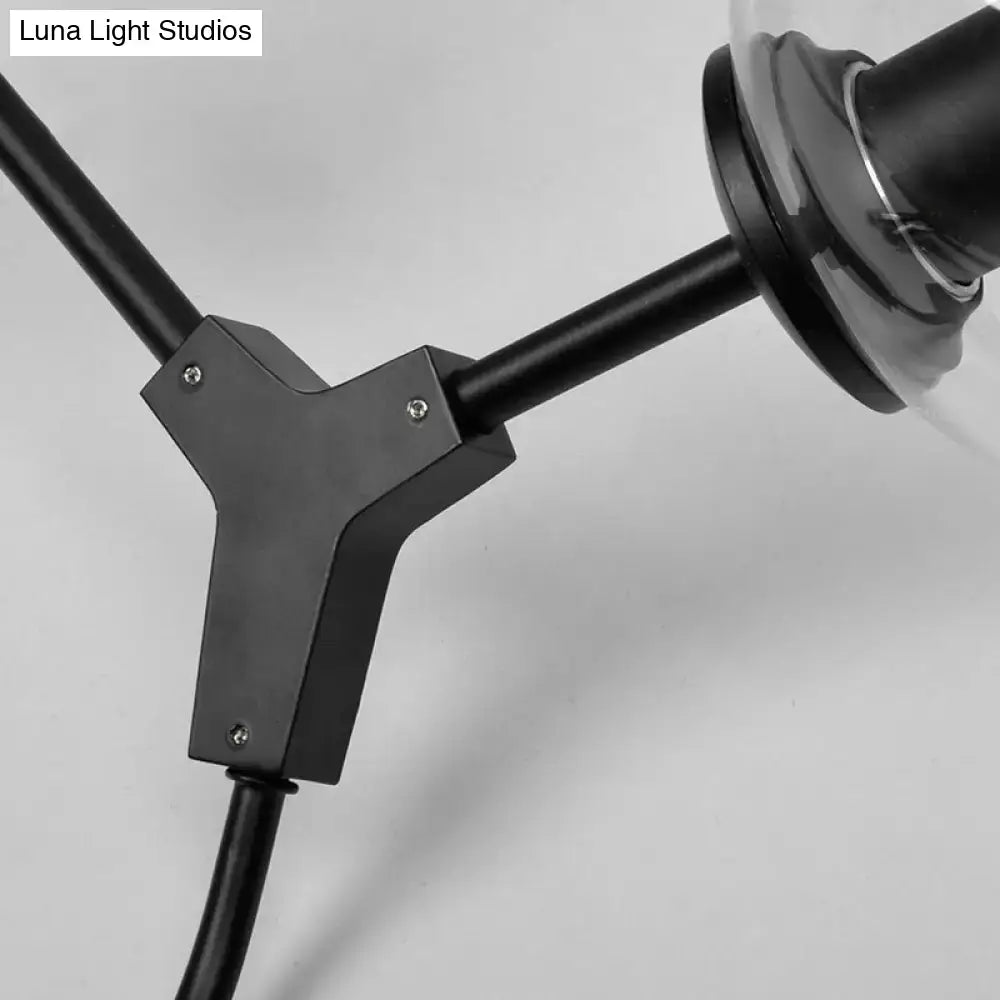Contemporary black matte metal y-shaped light wall sconce bracket with three arms for clear glass shade fixture