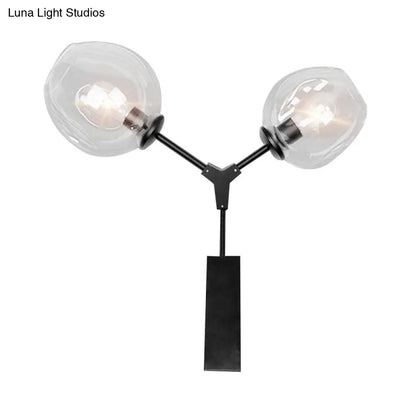 Aplique de pared contemporáneo DecorBites™ negro/dorado con pantalla ovalada de cristal ámbar/dorado/transparente - Elegante aplique de pared de media luz