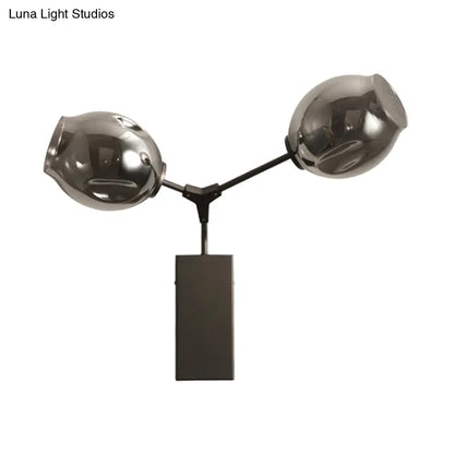 Aplique de pared contemporáneo DecorBites™ negro/dorado con pantalla ovalada de cristal ámbar/dorado/transparente - Elegante aplique de pared de media luz