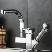 Contemporary black kitchen faucet with single handle and sleek chrome curved spout with extendable spray head