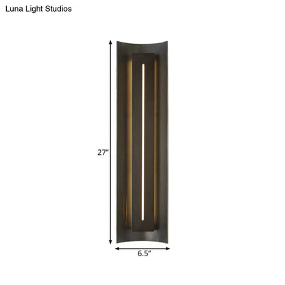 Contemporary black led wall lamp with metal shade featuring a sleek dark bronze finish and illuminated vertical slit design