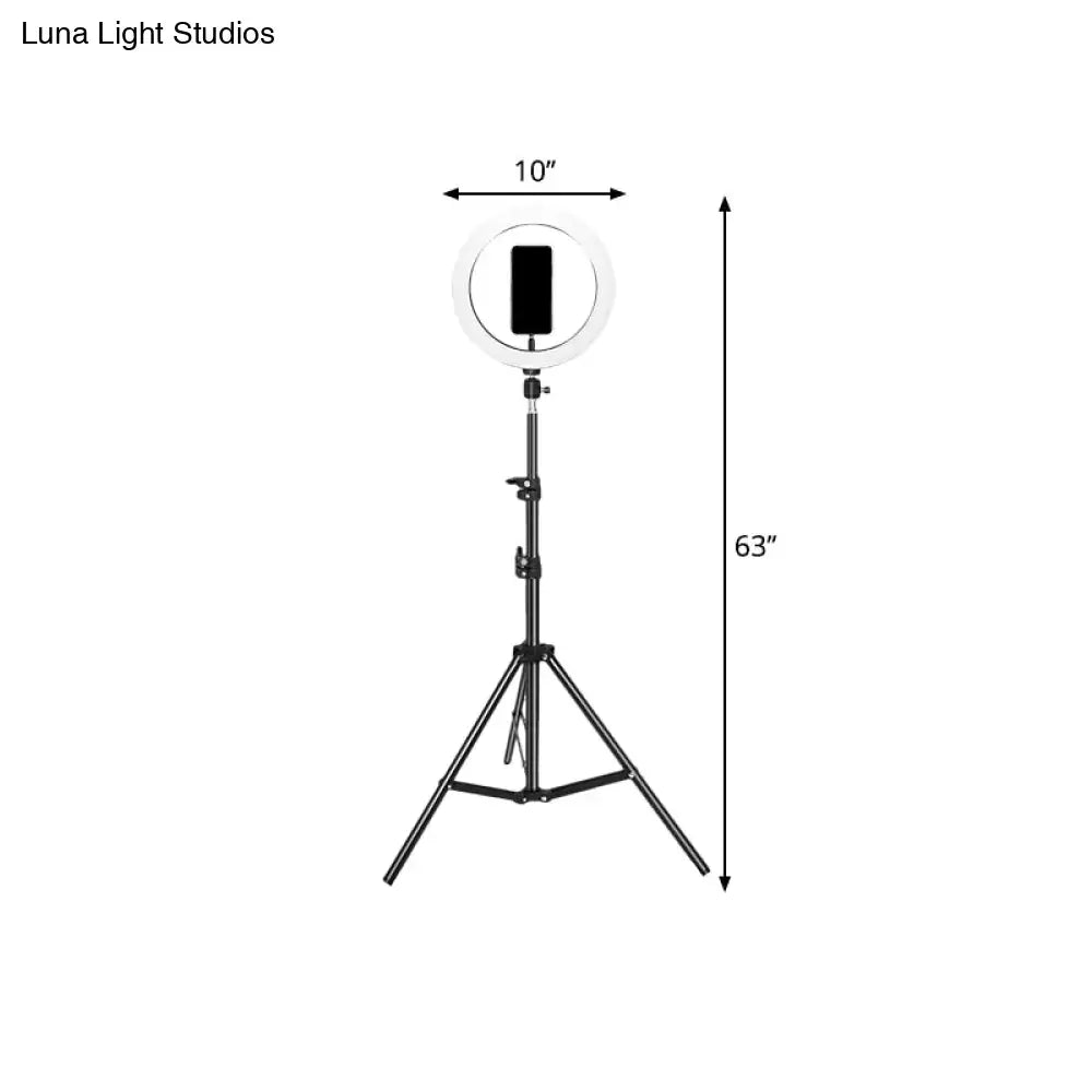 Contemporary black metal ring flash lamp with usb port and bulb included featuring a 10-inch ring light and adjustable tripod