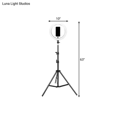 Contemporary black metal ring flash lamp with usb port and bulb included featuring a 10-inch ring light and adjustable tripod