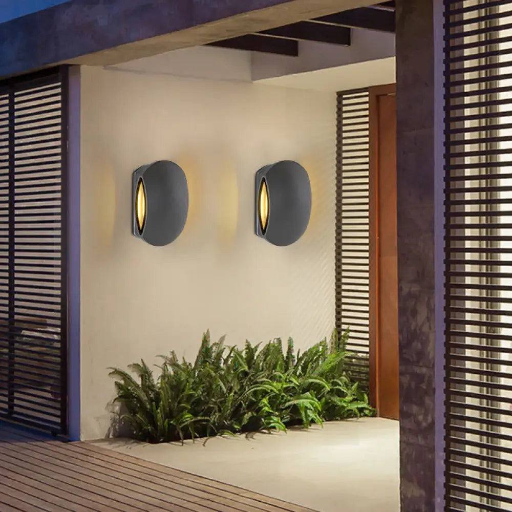 Aplique de pared redondo exterior contemporáneo DecorBites™ negro - Estructura de aluminio, blanco cálido