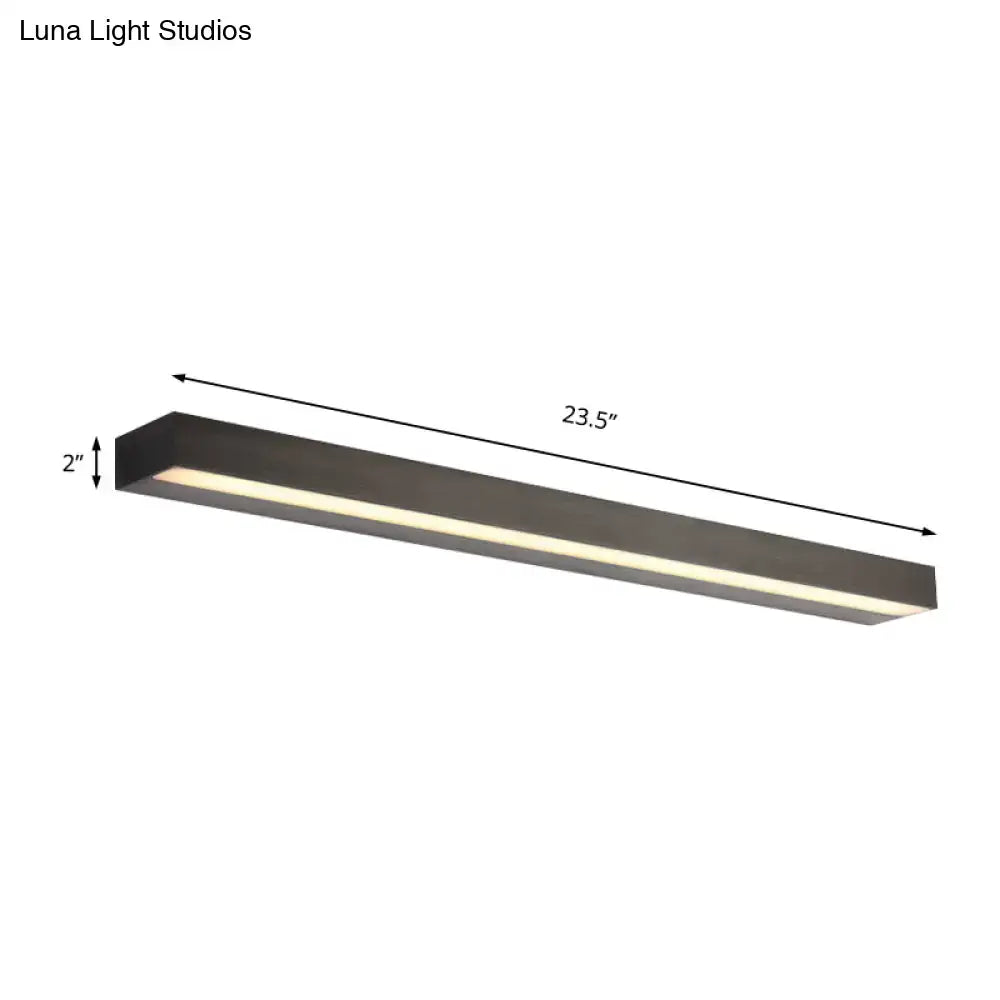Contemporary black and silver linear vanity sconce with sleek matte finish and white warm LED illumination