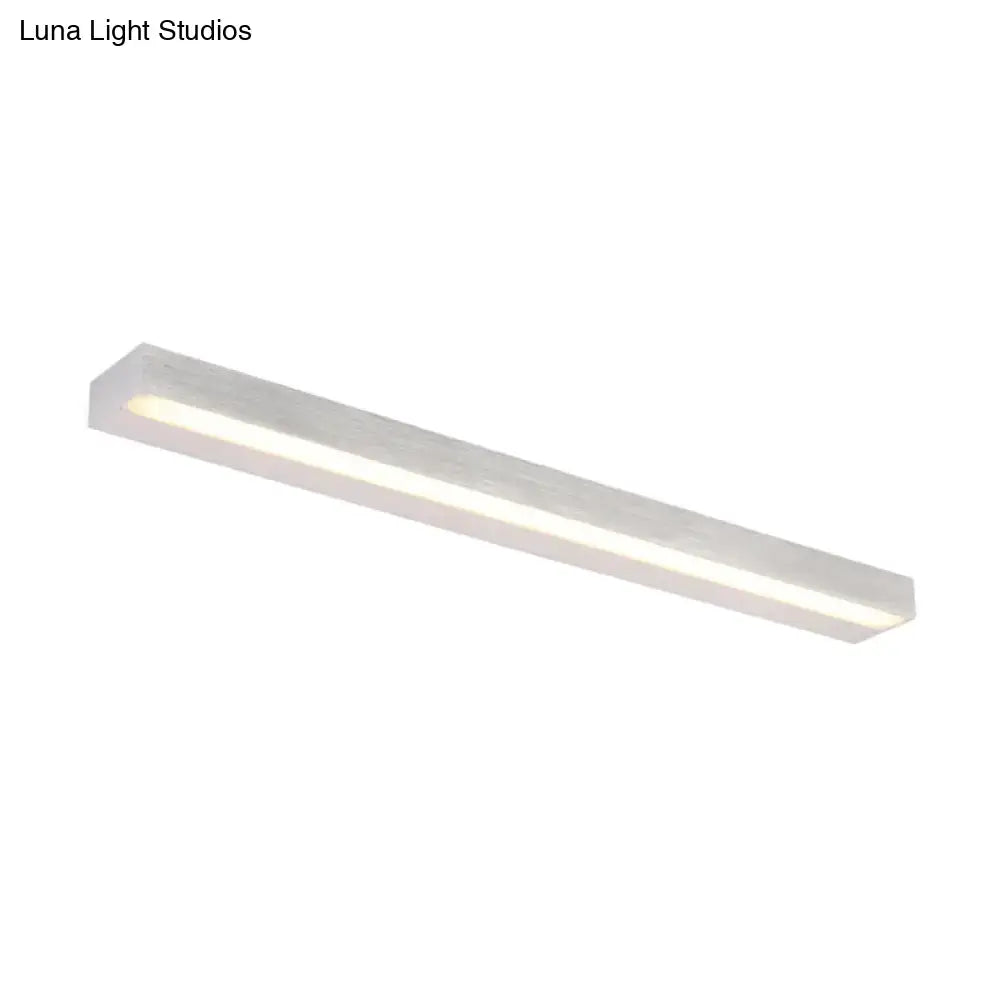 Modern white warm rectangular linear vanity sconce with sleek minimalist design for contemporary bathroom lighting