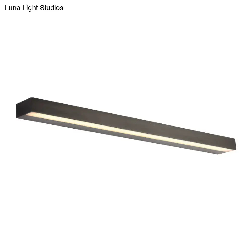 Modern matte black rectangular linear vanity sconce with sleek minimalist design and white warm led light for bathroom use