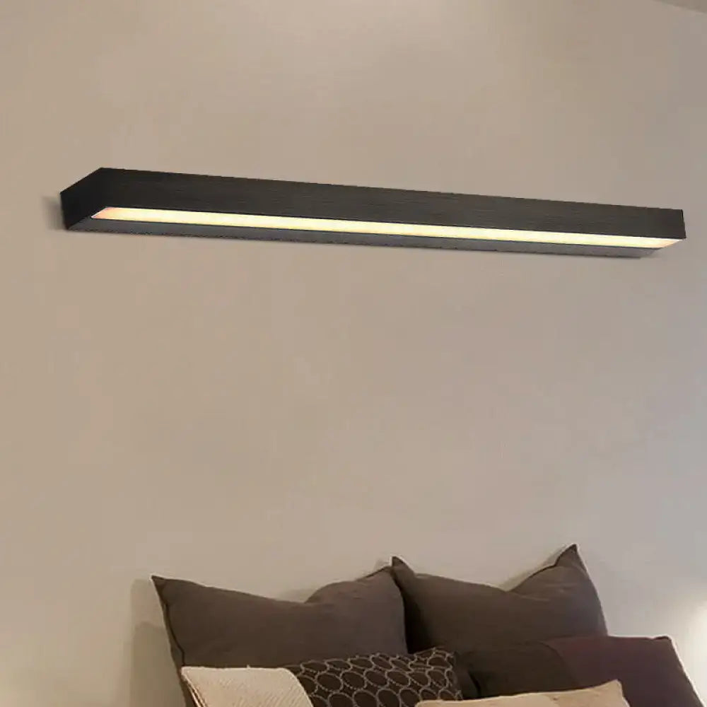 Contemporary black and silver linear vanity sconce with white warm led light and sleek modern design for bathroom use