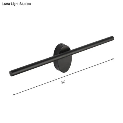Contemporary black matte wall light with slim cylindrical bar and circular base for bedroom natural light fixture