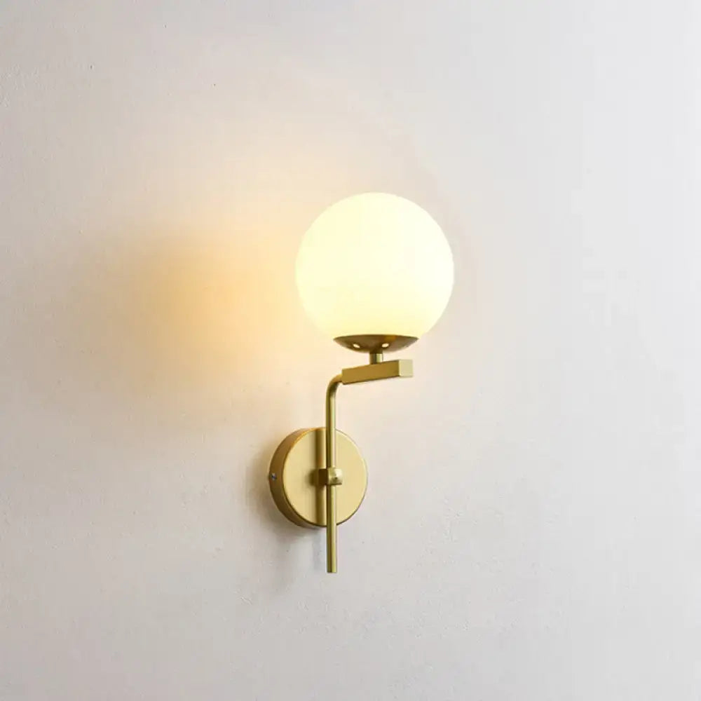 Contemporary gold-toned wall mount lighting with frosted glass globe for bedroom mount lighting fixture