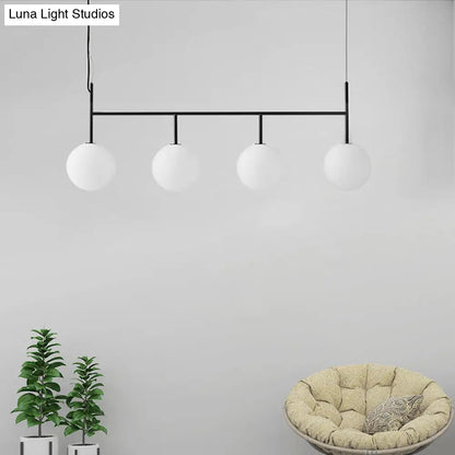 Lámpara de isla colgante contemporánea negra DecorBites™ con esfera de cristal blanco y 4 bombillas