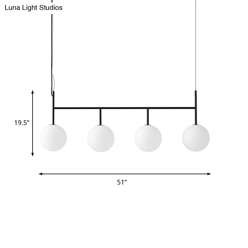 Lámpara de isla colgante contemporánea negra DecorBites™ con esfera de cristal blanco y 4 bombillas