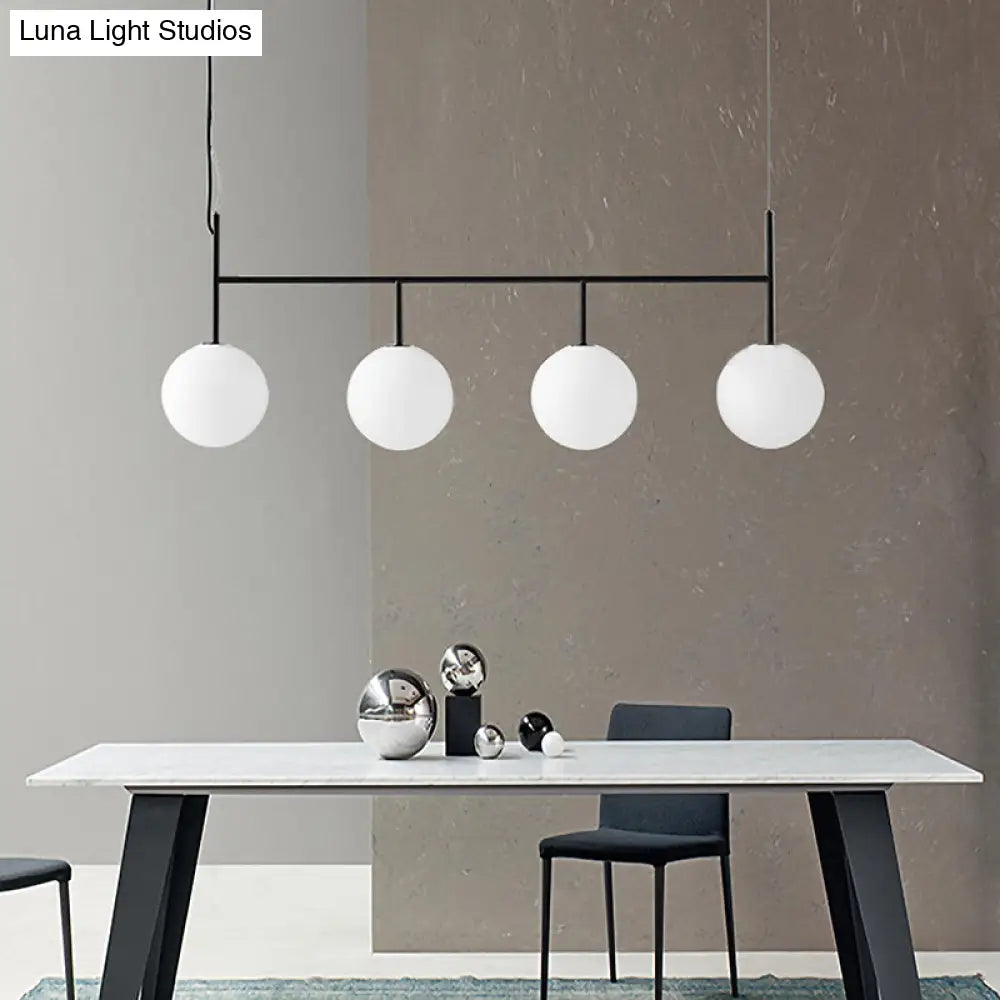 Lámpara de isla colgante contemporánea negra DecorBites™ con esfera de cristal blanco y 4 bombillas