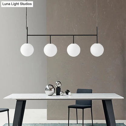 Lámpara de isla colgante contemporánea negra DecorBites™ con esfera de cristal blanco y 4 bombillas