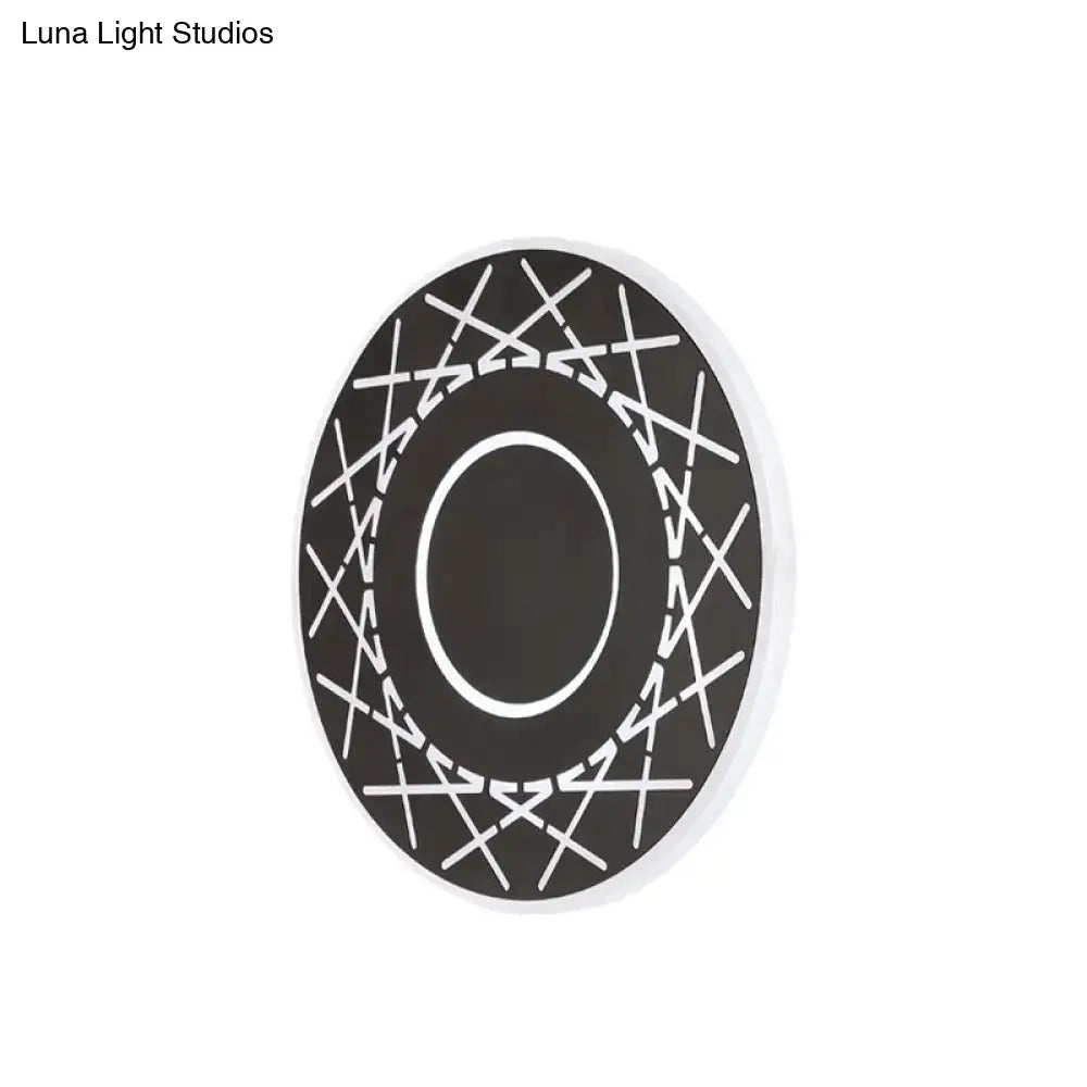 Contemporary black white geometric wall lamp coaster with intersecting lines and inner oval for living room decor