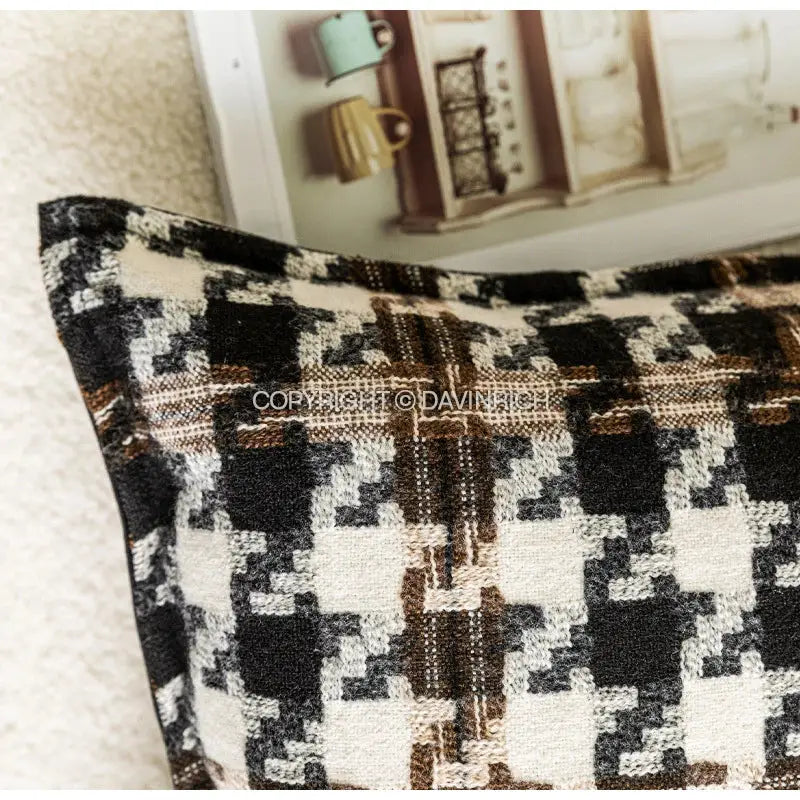 Contemporary black and white houndstooth square cushion cover with beige textured woven fabric for living room decorbites