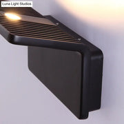 Contemporary black and white slatted LED wall lamp with warm glow, rectangular living room wall lamp fixture