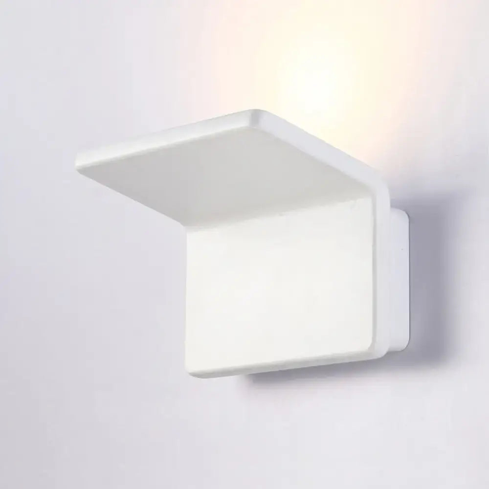 White rectangular wall lamp with black and white slatted design and led lighting for modern living room use
