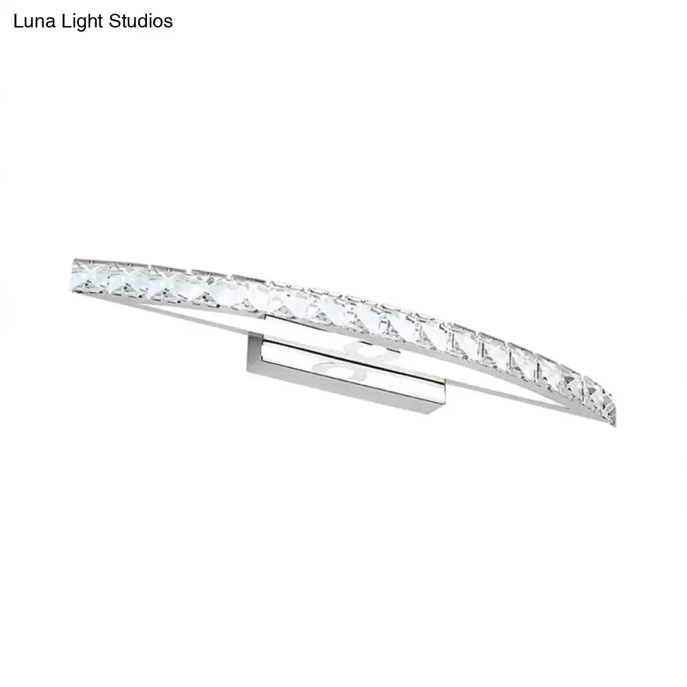 Contemporary bow shaped silver vanity lighting wall sconce with chrome finish and clear faceted crystal accents