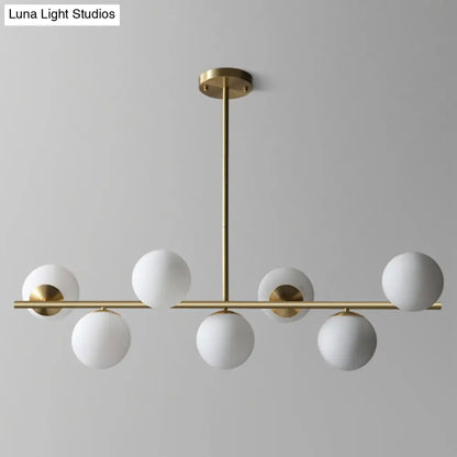 Lámpara colgante contemporánea de latón DecorBites™ con 7 luces de cristal blanco, ideal para iluminar la sala de estar.