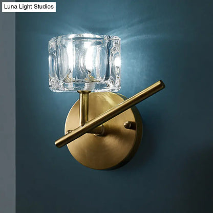 DecorBites™ DecorBites™ Contemporary Brass Wall Sconce with Clear Crystal Shade for Bedroom