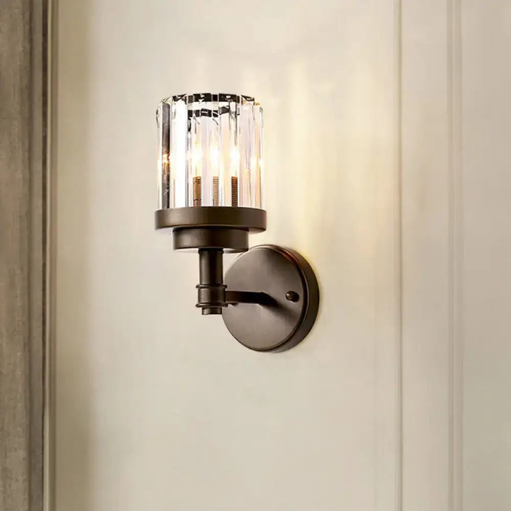 Contemporary bronze wall sconce with ribbed crystal shade and dark bronze cylindrical glass light fixture for hallways