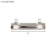 Contemporary chrome conic sconce light with dual crystal accents and sleek modern design for bathroom vanity lighting