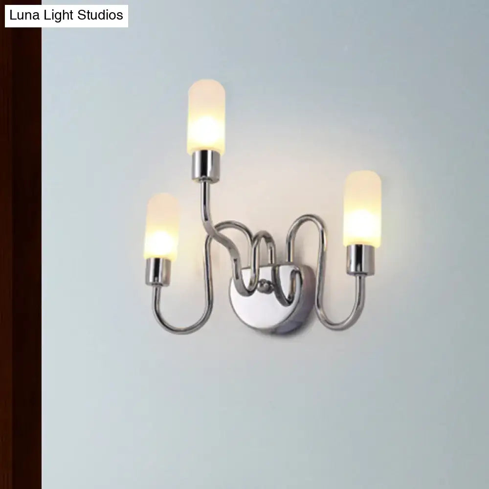 Contemporary chrome bedroom wall sconce with three curved arms and frosted milk glass shades for elegant lighting