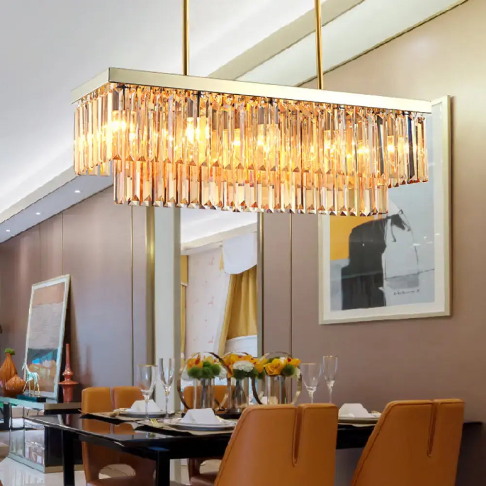 Gold-toned rectangular chandelier with cascading clear amber crystal prisms light fixture for dining room use