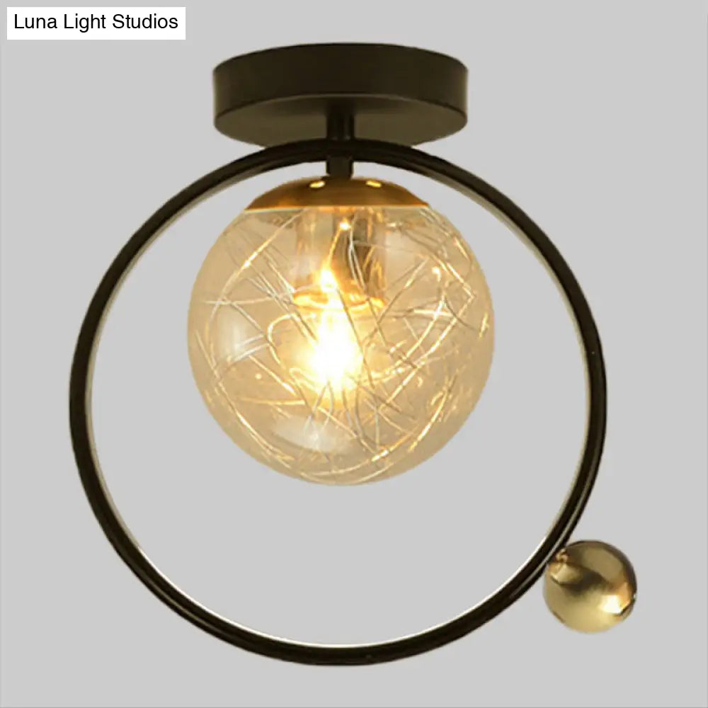 Contemporary Clear Glass Ceiling Light: Spherical Semi Flush Fixture with Single Bulb, Black Mount and Globe/Bird Decor