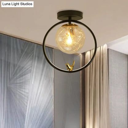 Contemporary Clear Glass Ceiling Light: Spherical Semi Flush Fixture with Single Bulb, Black Mount and Globe/Bird Decor