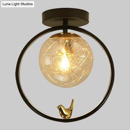 Contemporary Clear Glass Ceiling Light: Spherical Semi Flush Fixture with Single Bulb, Black Mount and Globe/Bird Decor