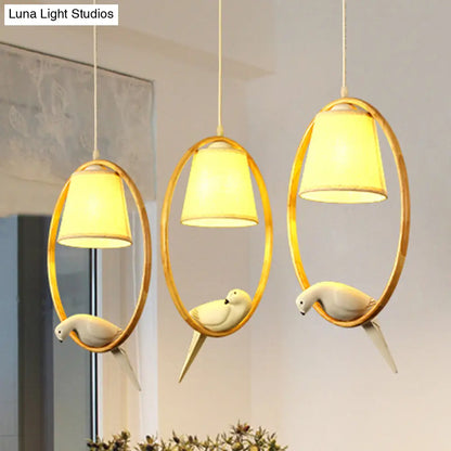 Contemporary Cone Fabric Pendant Lamp with Wood Ring and Resin Bird - 1/3 Lights, White Fixture