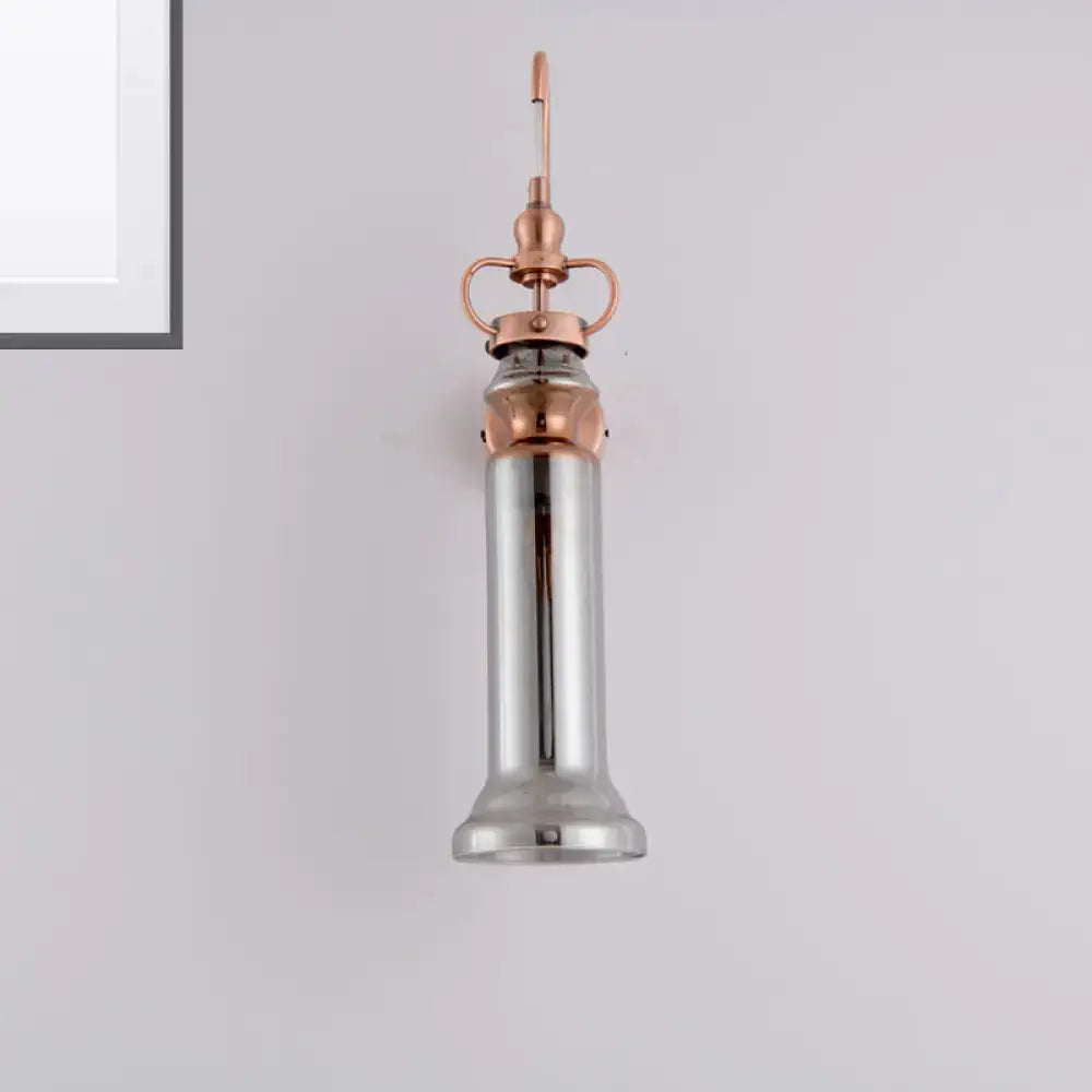 Contemporary copper wall sconce bedroom light with smoke gray amber cylindrical glass shade and chrome pendant design