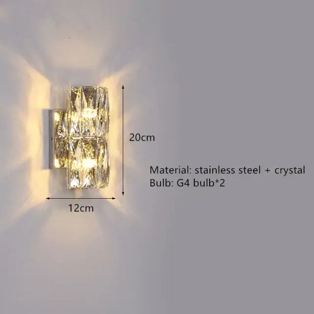 Contemporary crystal wall sconce with gold frame and faceted crystal panels for warm bedroom lighting by decorbites contemporary crystal