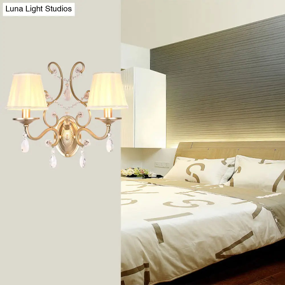 DecorBites™ DecorBites™ Contemporary Crystal Wall Sconce with Curved Arm and Brass Finish