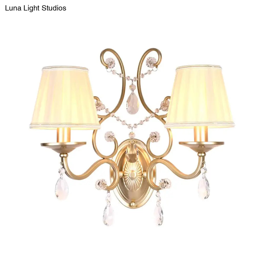 DecorBites™ DecorBites™ Contemporary Crystal Wall Sconce with Curved Arm and Brass Finish