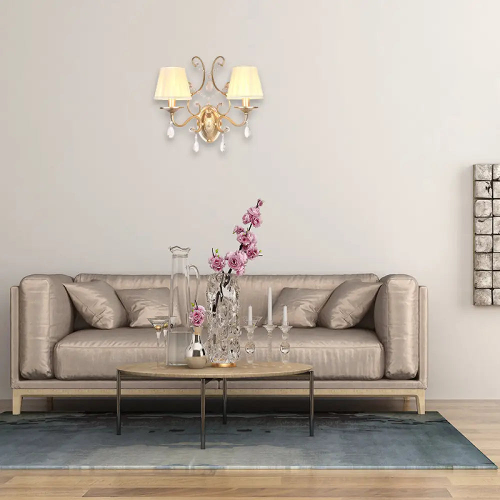 DecorBites™ DecorBites™ Contemporary Crystal Wall Sconce with Curved Arm and Brass Finish